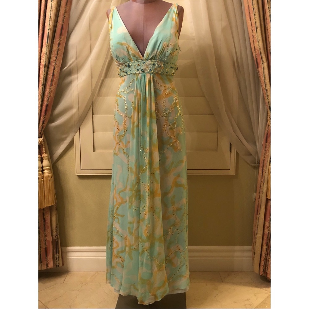 LIGHT GREEN AND GOLD EVENING GOWN WITH CRYSTAL